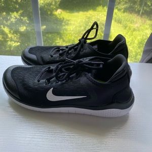 worn once, black nike shoes, with soft cushion on the bottom